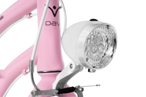 Rosa cykel med glänsande vit framlampa