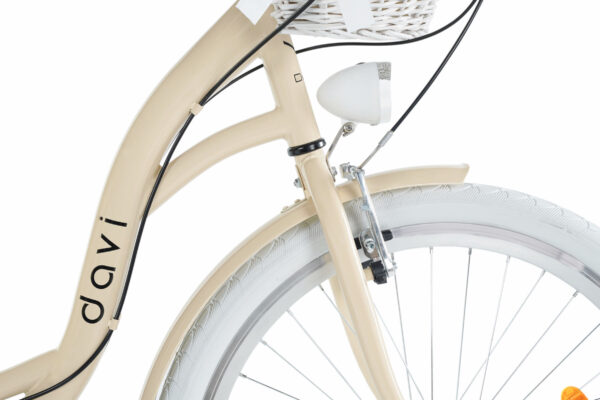 Beige cykel med framkorg och vit däck