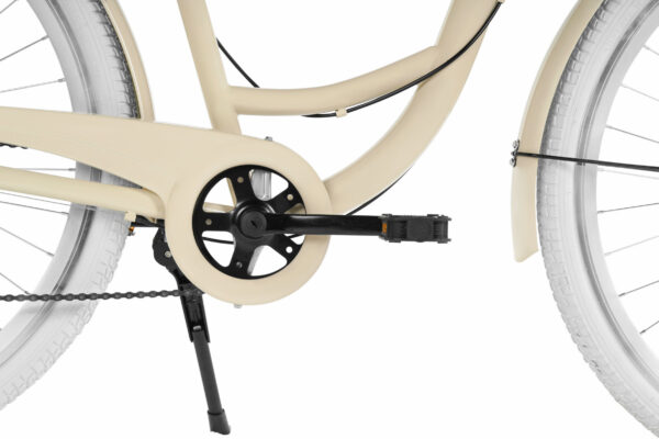 Beige cykel med kedjeskydd och stöd