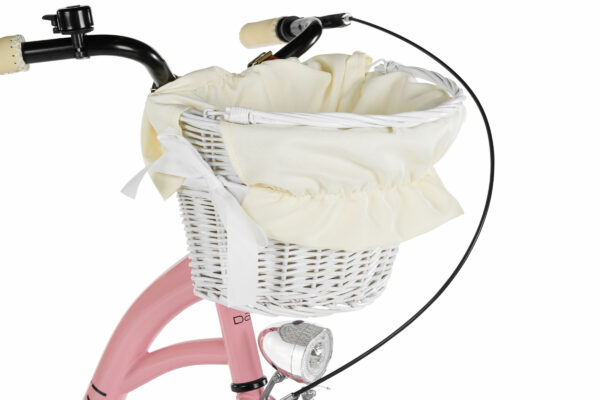 Cykelkorg i vitt med beige duk och rosett.