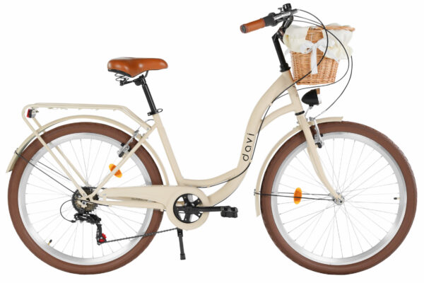 Klassisk cykel med korg och bruna däck.