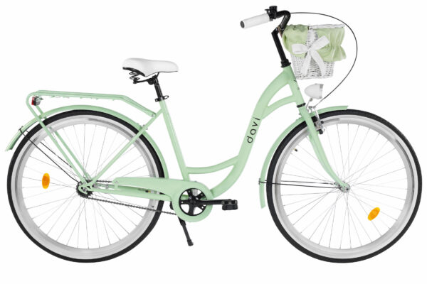 Grön damcykel med korg och vit sadel.