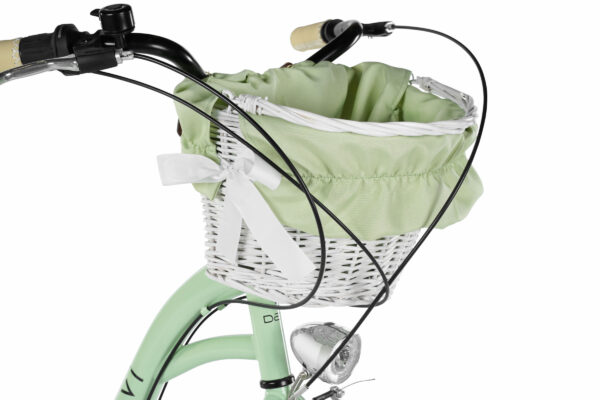 Cykelkorg med grönt tyg och vit rosett