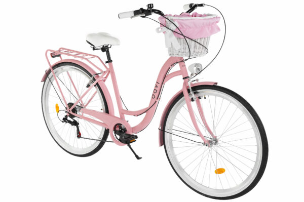 Rosa damcykel med korg och vit sadel.